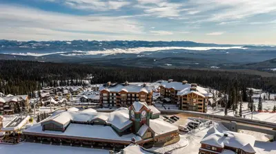 an aerial view of a resort in the snow at Grizzly Ridge Getaway - Private Hot Tub, Mtn View & Sleeps 11 in Big White