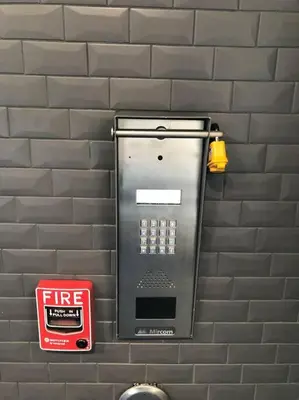 a fire hydrant is attached to a brick wall at Steamy Romantic Greek Corneer Suite King U/G Wifi in Edmonton