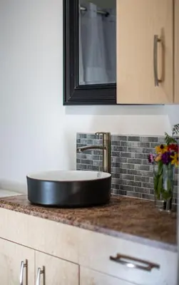 a sink on a counter in a bathroom at Downie Cottage by Revelstoke Vacations in Revelstoke