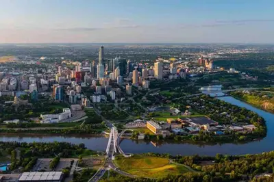 an aerial view of a city with a river and a bridge at Royal Blue Wild Oasis Corner PNHSE KingBed U/G Wi-fi in Edmonton