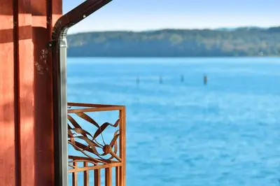 a view of the water from a balcony at Salishan Tree House Suite by EMR Vacation Rentals in Cowichan Bay