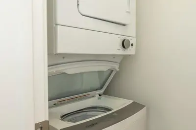 a bathroom with a toilet in a small room at NN - The Evelyn - Whistlebend 1-bed 1-bath in Whitehorse