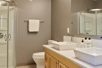 a bathroom with two sinks and a shower at NN - The Kluane - Whistlebend 3-bed 2-bath in Whitehorse