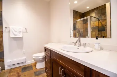a bathroom with a sink and a toilet at NN - Park View #2 - Downtown 2-bed 2-bath in Whitehorse