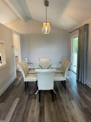 a dining room with a table and chairs at Escape to Spring Gate Estate in Victoria