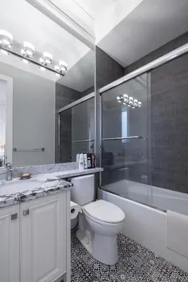 a bathroom with a toilet and a tub and a sink at Luxurious Private Rooms in Richmond in Richmond