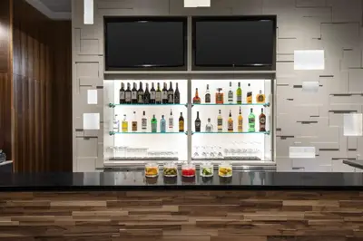 a refrigerator filled with lots of bottles of alcohol at Courtyard by Marriott Nanaimo in Nanaimo