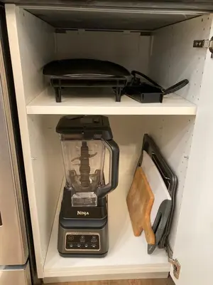 a blender sitting on a shelf in a refrigerator at Bright poolside walkout two bedroom basement suite in the Okanagan in Penticton