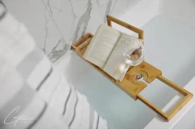 a shelf with a book and a wine glass at King Bed,Disney,Long Stays,Garage,Airport in Edmonton