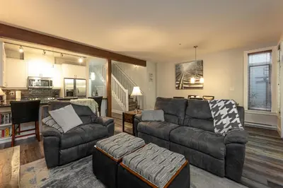 a living room with two couches and a couch at Pacific Forest Beach House in Parksville