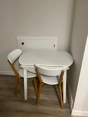 a white desk and chair in a room at Cozy New Suite in NW Calgary in Calgary