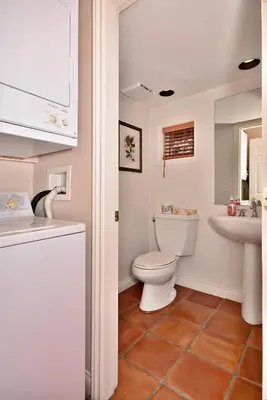 a bathroom with a toilet and a sink at Villas at Eldorado Resort in Kelowna