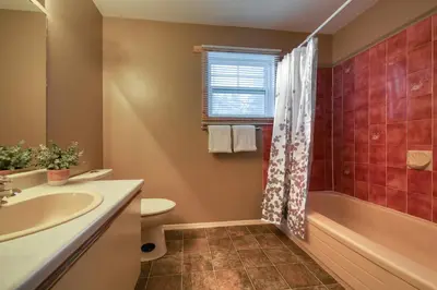 a bathroom with a sink and a toilet and a shower at Fairmont Hot Springs, 3 Bedroom Vacation Home in Fairmont Hot Springs