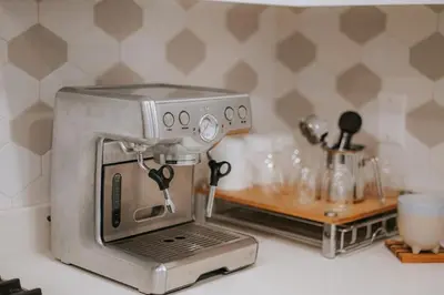 a mixer sitting on top of a kitchen counter at A Gentle Hideaway in the Urban Forest WEST END downtown Vancouver in Vancouver