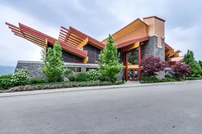 a rendering of a building on a street at Top Floor Apartment at Amenity Rich Resort 406 in West Kelowna