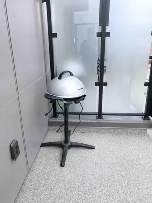 a table with a lid on it in front of a door at Top Floor Lakeshore Views Near Skiing in Vernon