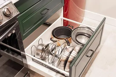a drawer in a kitchen with pots and pans at Vancouver Nest Downtown 2BR near Rogers Arena in Vancouver