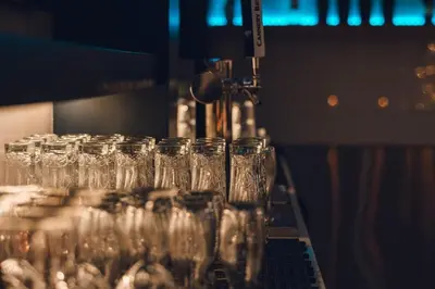 a group of wine glasses sitting on a machine at Four Points by Sheraton Penticton at the Convention Centre in Penticton