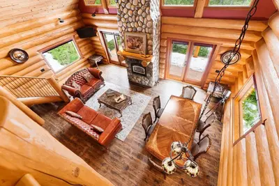 an overhead view of a living room in a log cabin at Gem by Manning Park: Luxury Loghouse “Ravenloft” in Sunshine Valley